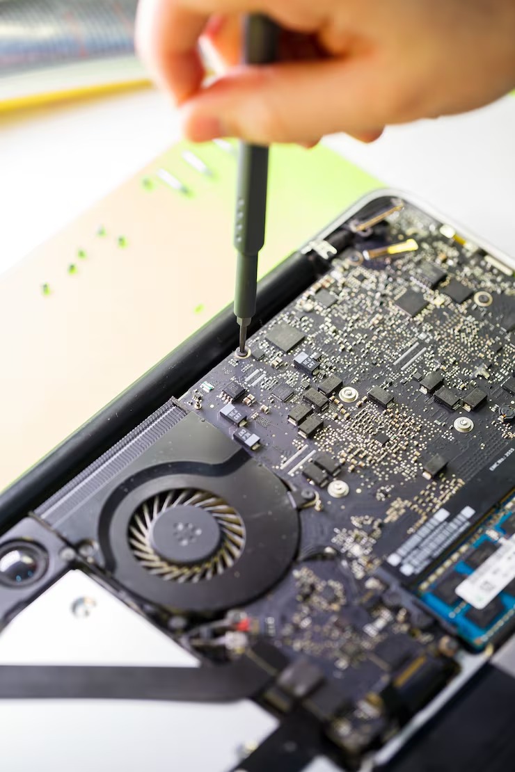 imgi_30_man-cleans-laptop-with-special-tool-from-dust-repair-maintenance-laptops-pcs-advertising-services-repair-electronics-devices_173815-7386